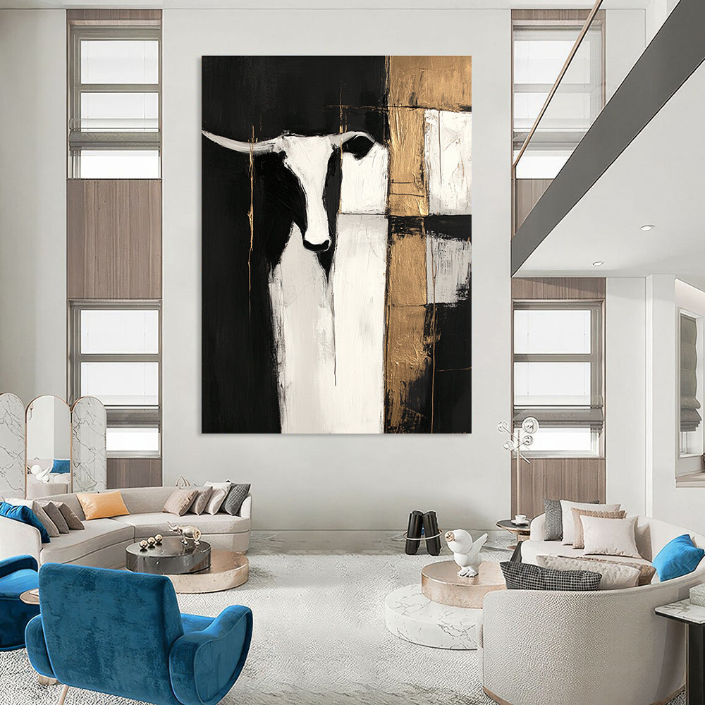 Large abstract painting in black and white with gold accents featuring cow shapes and wood planks on a dark background with visible brush strokes.STSC223