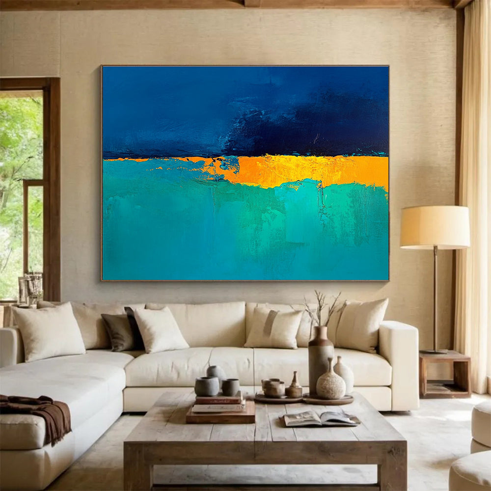 Large abstract painting in deep blue and turquoise with a golden yellow horizon perfect for enhancing modern interiors.SC524