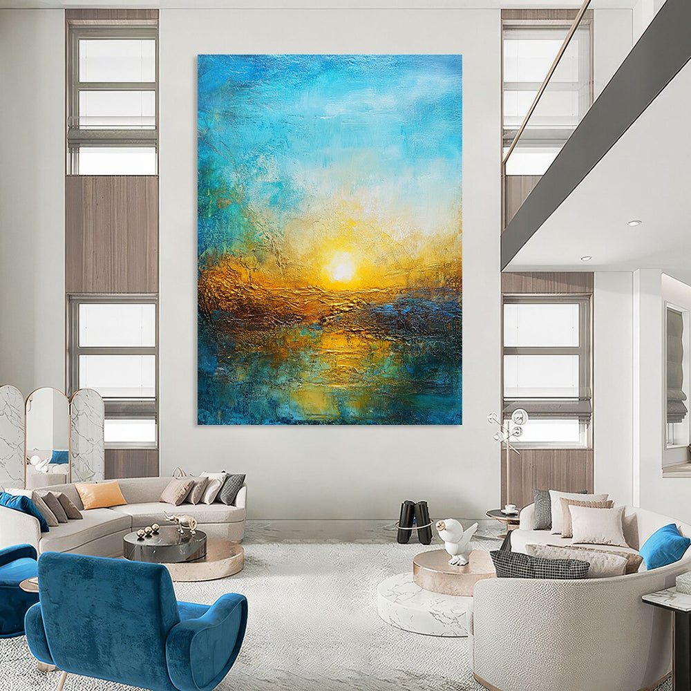 Large abstract painting featuring a vibrant sunset in golden hues and deep blues over a textured landscape symbolizing new beginnings and hope.STSC200