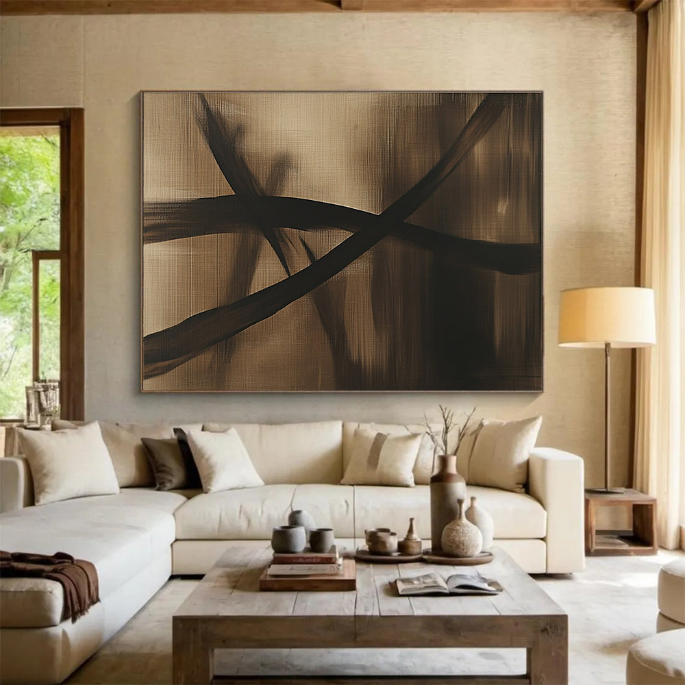 Large abstract painting in brown and black tones featuring a dragonfly silhouette and flowing lines on a dark gray background, exuding mystery and simplicity.SC586