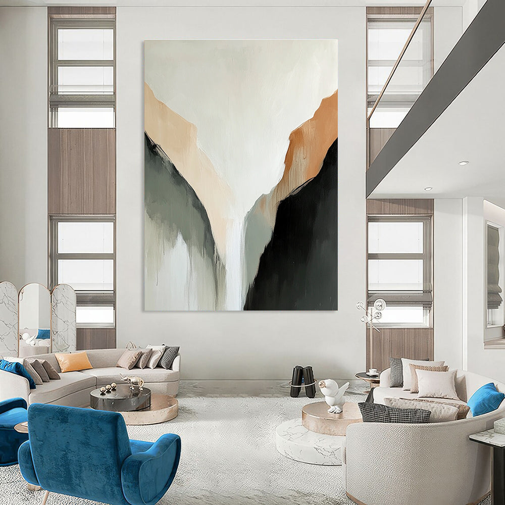 Large abstract painting of a tranquil mountain range in muted beige and black tones against a serene white background.STSC652