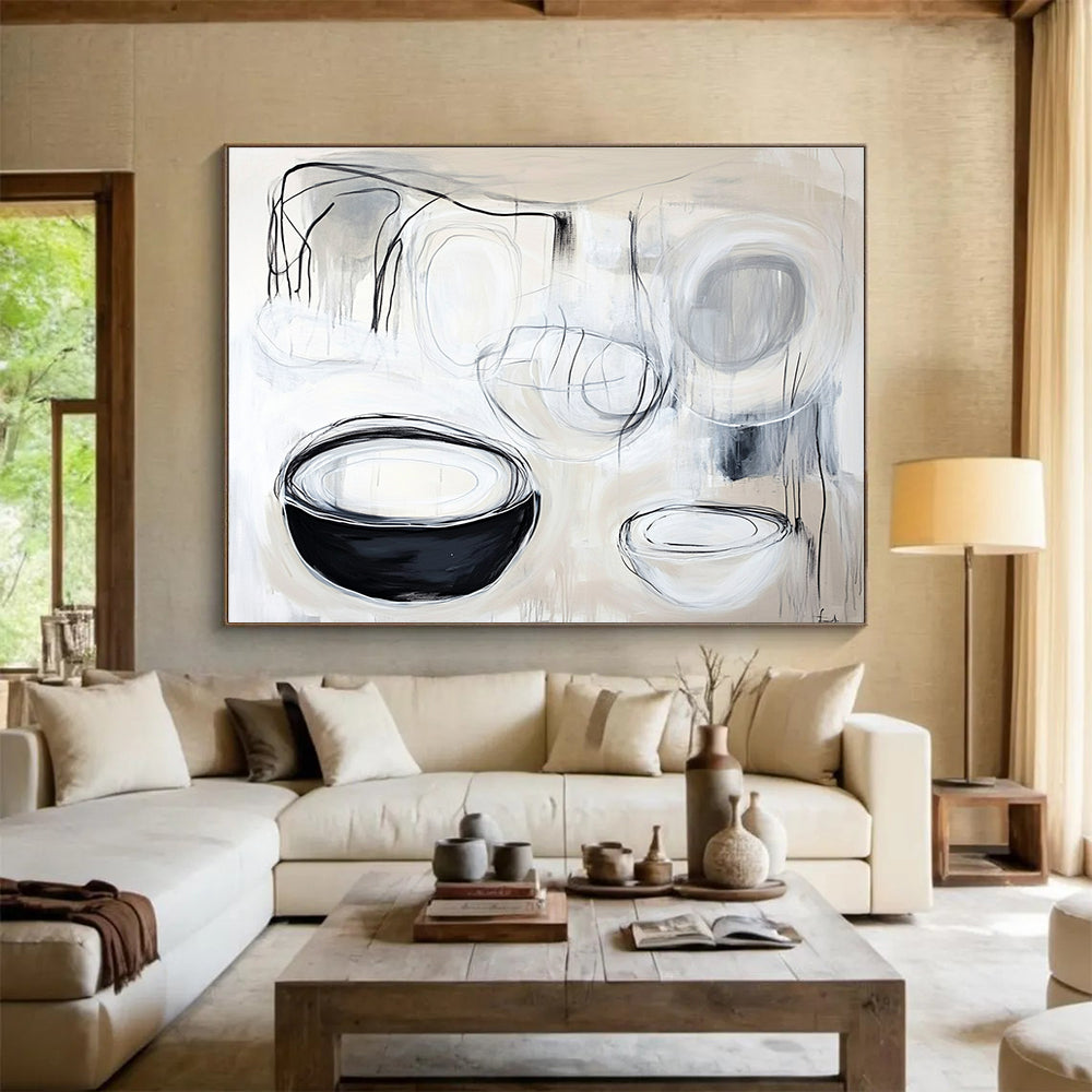 A large abstract painting featuring organic white and black lines, highlighting shapes of cups and plates with expressive black ink strokes.SC389