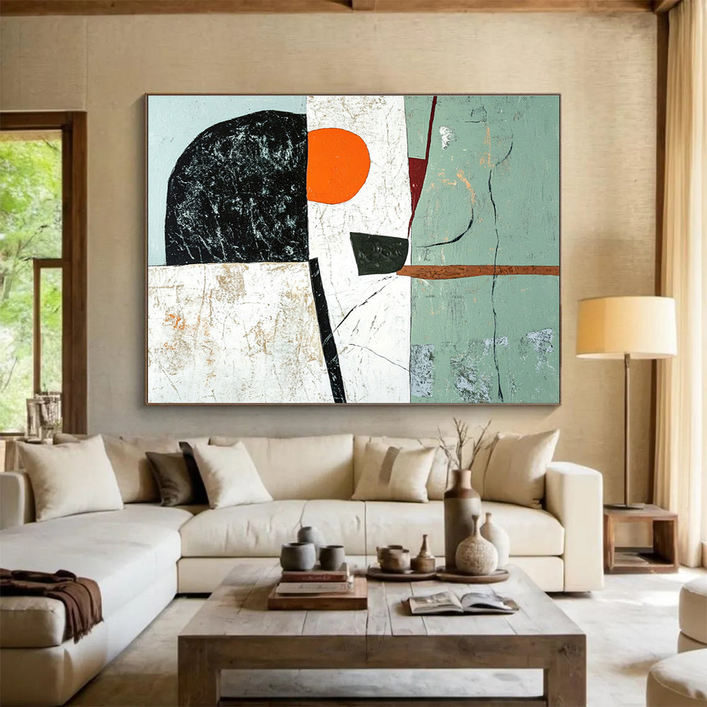Large abstract painting featuring green black and white shapes with an orange accent and a brown line on a light gray and pale blue background.SC192