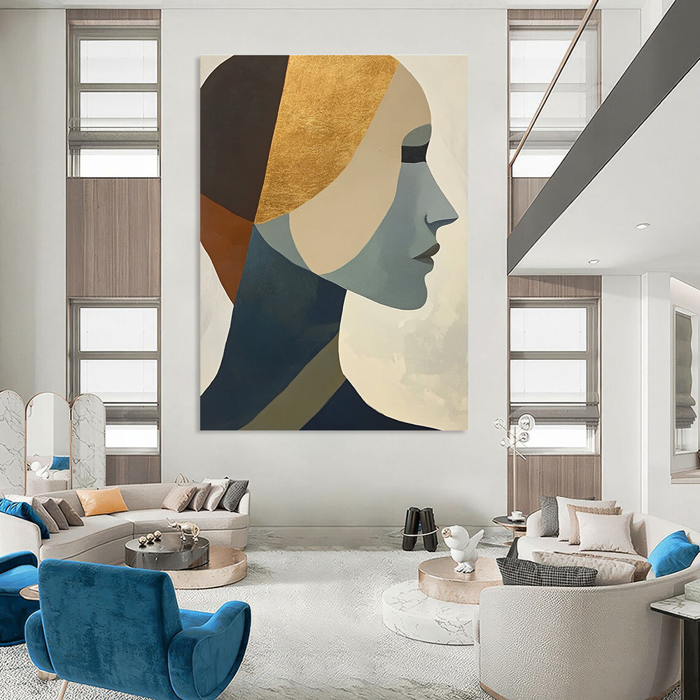 Large abstract painting featuring cubist shapes and lines muted colors gold foil accents and a hint of the female form.STSC692