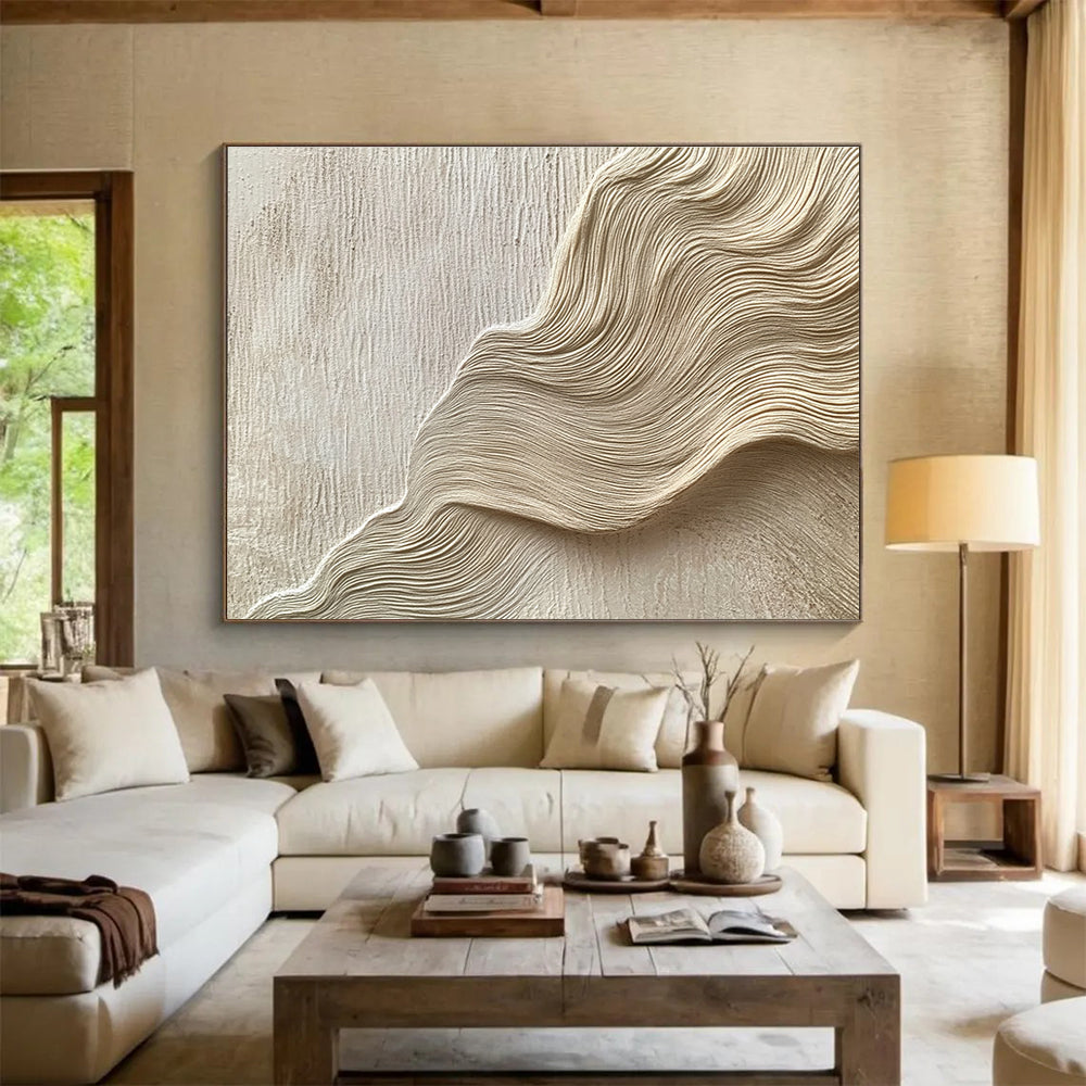Large abstract painting featuring layered waves and curves in light beige tones resembling water ripples on sand dunes with fine brushwork.SC613