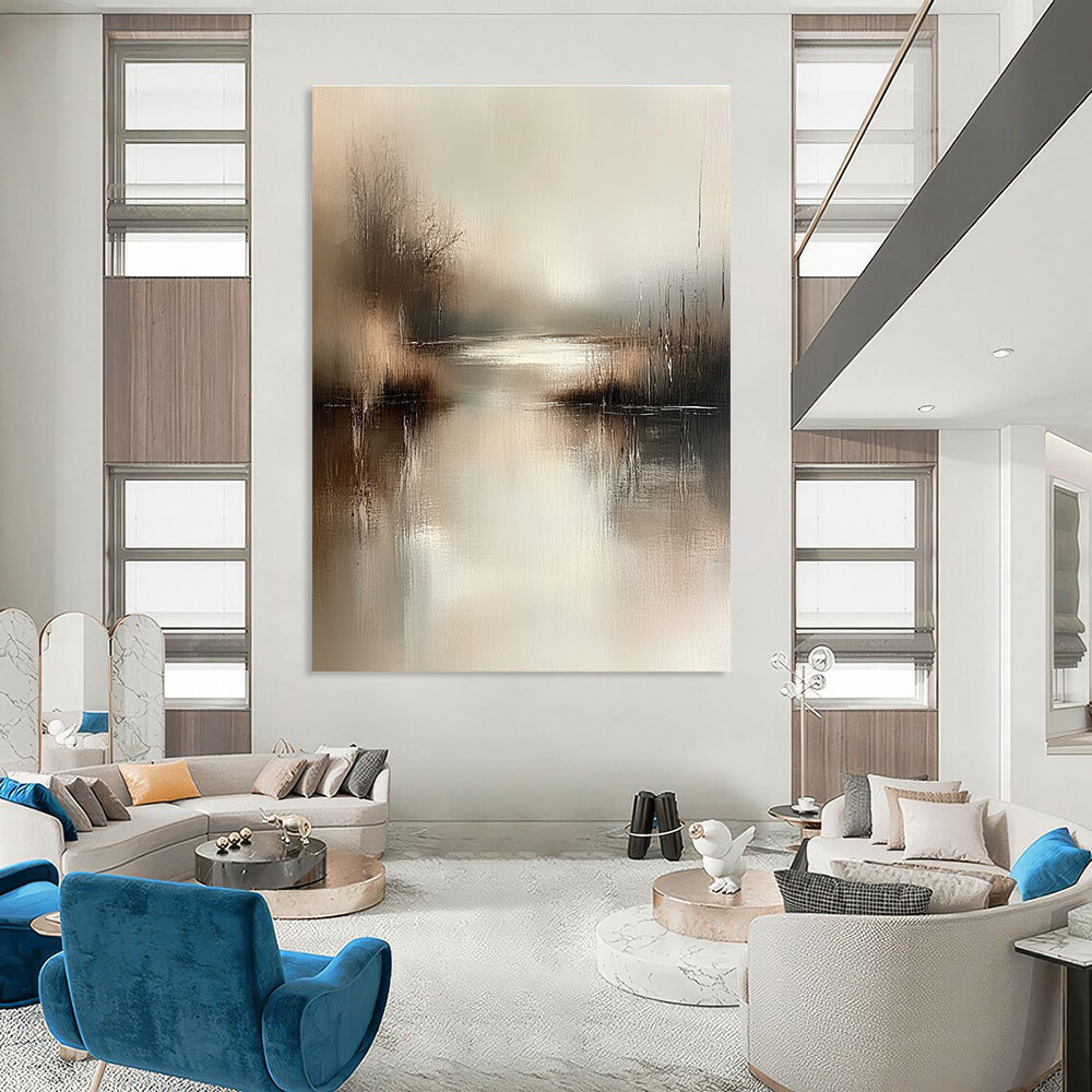 Large abstract painting in muted beige and grey tones captures serene water's edge with gentle brushstrokes evoking tranquility and calmness in any setting.STSC078