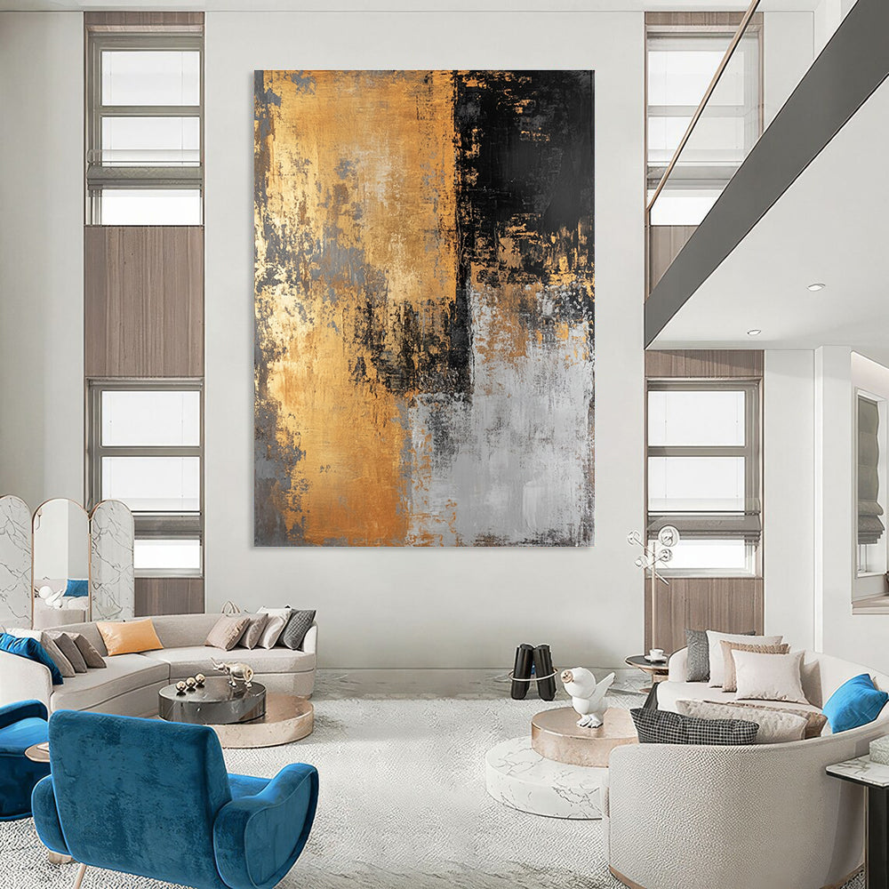 Large abstract painting in golden black and gray hues creates a striking visual impact perfect for modern decor.STSC576