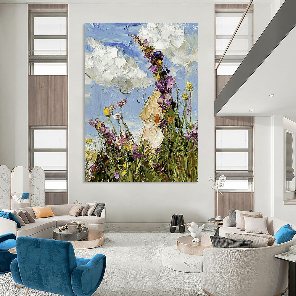 Large abstract oil painting featuring a colorful wildflower meadow under a blue sky with visible brushstrokes in an impressionist style.STSC1367