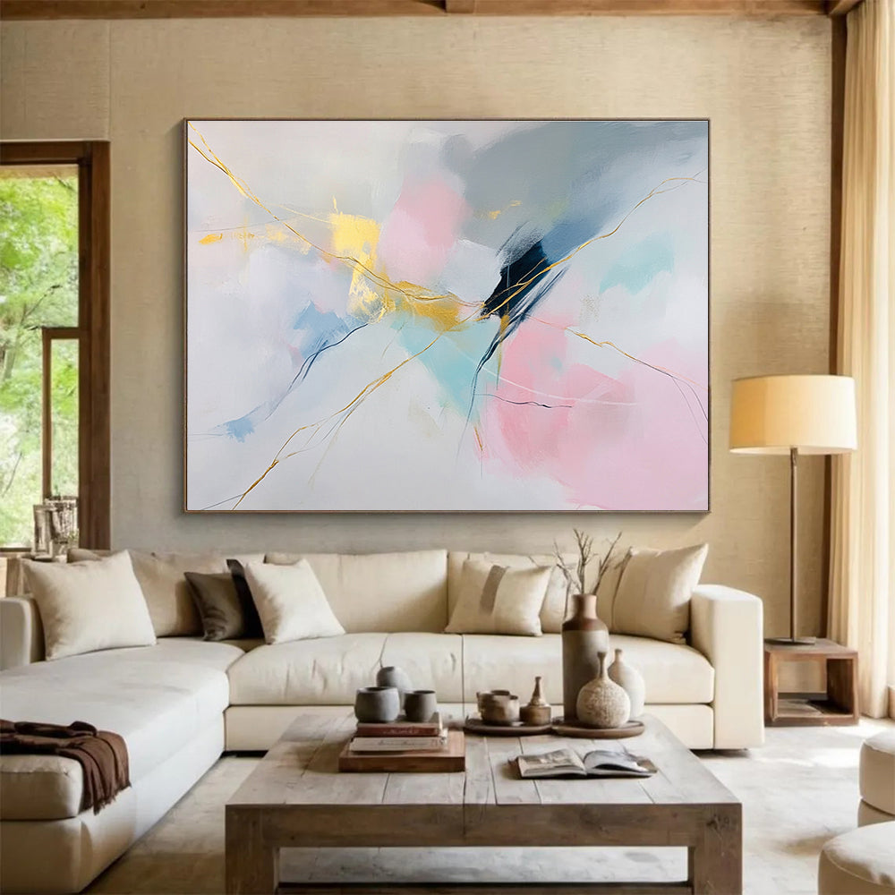 Large abstract painting featuring soft colors on white background with pink blue hues and gold accents delicate strokes create serene shapesSC282