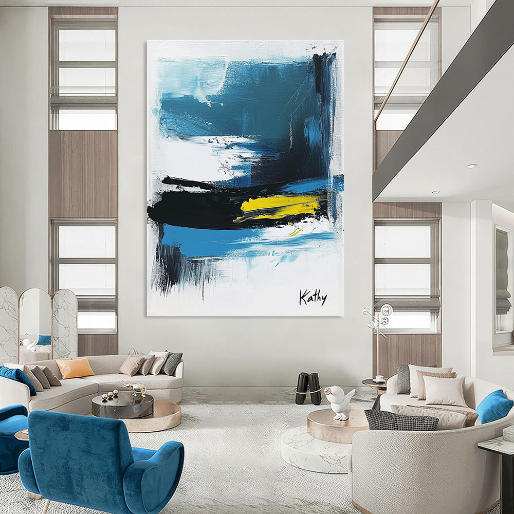 Large abstract painting of the sea featuring blue black and white brush strokes with yellow accents signed by Kathy.STSC1423