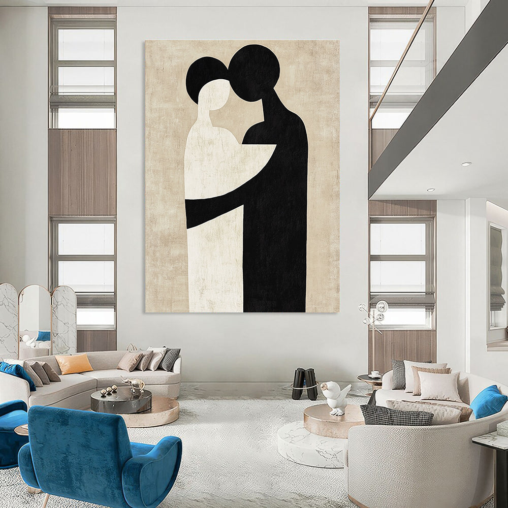 Large abstract artwork featuring black and white shapes that suggest an embrace against a neutral beige background in the style of Paul Klee.STSC473