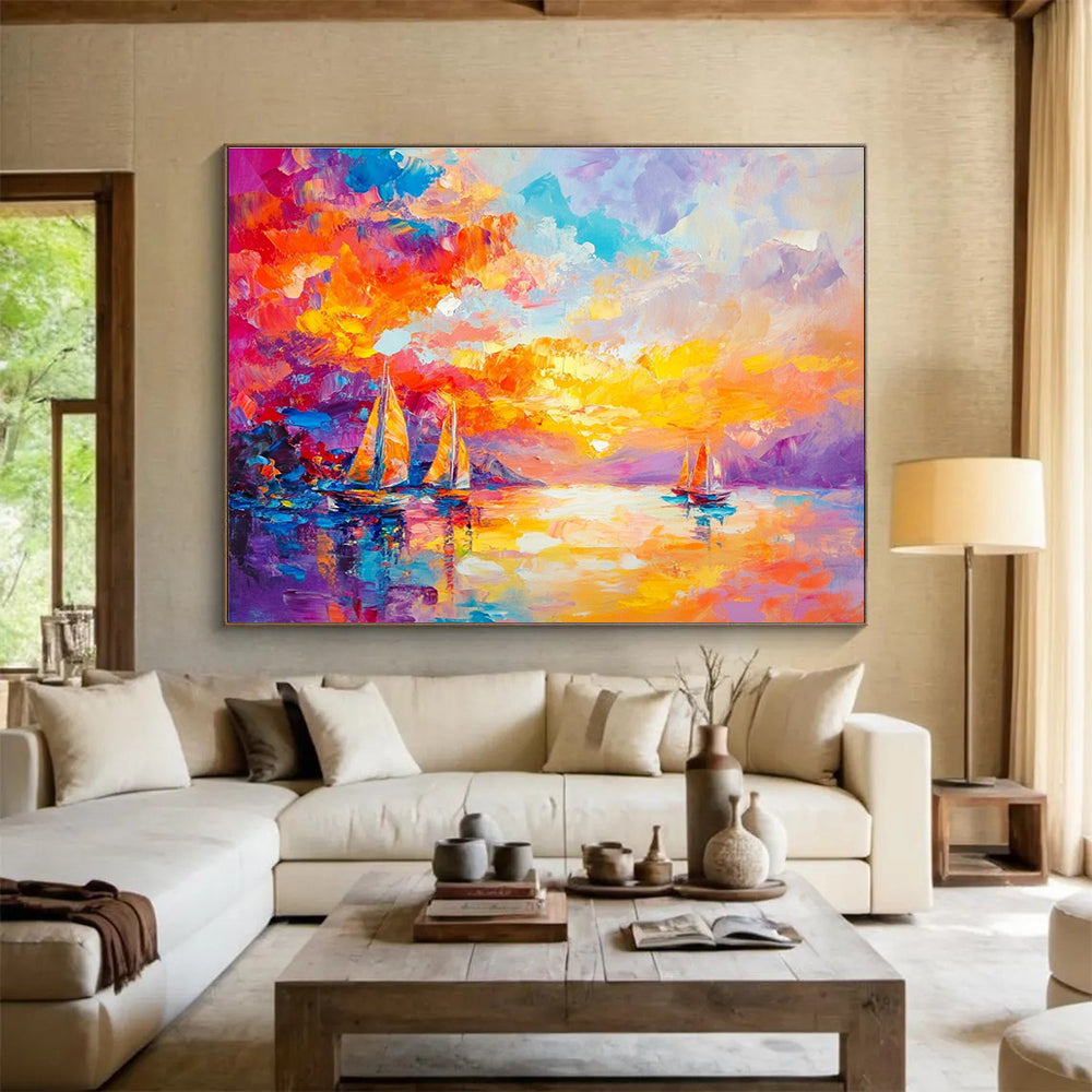 Large abstract painting capturing a vibrant sunset over the sea with sailboats in a colorful and dreamlike style.SC180