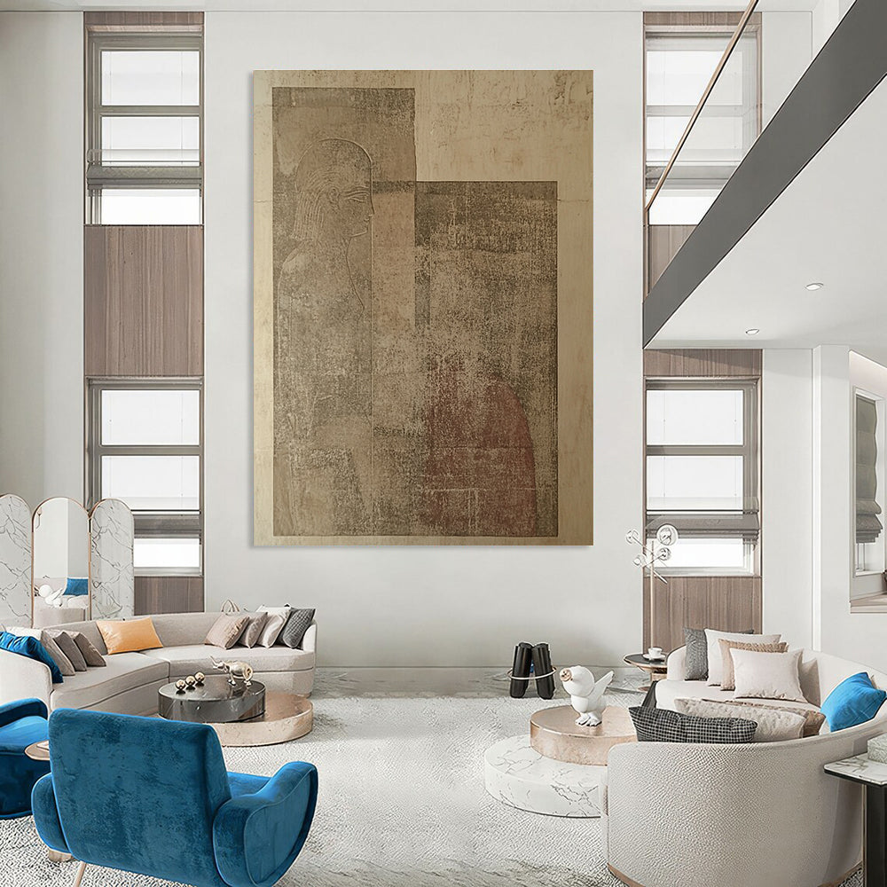 Large abstract artwork featuring ancient tablet carvings depicting two human figures against beige walls, showcasing unique artistic expression and historical intrigue.STSC1156