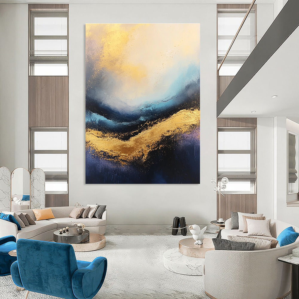 Large abstract painting of stormy seas featuring rich gold and blue tones with a captivating textured surface.STSC333