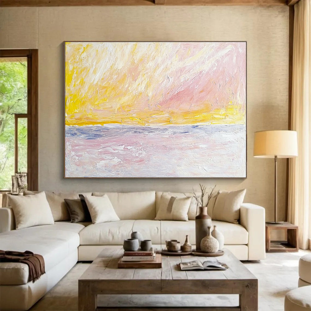 Large abstract painting of sky and sea in Turner style featuring pale pink yellow and beige colors with bold brush strokes.SC365