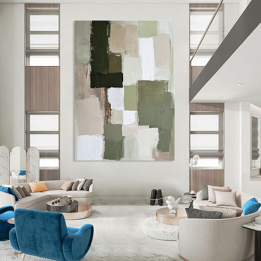 Large abstract painting featuring soft neutral tones like sage green and beige with dynamic textures and shapes that create a calm atmosphere.STSC767