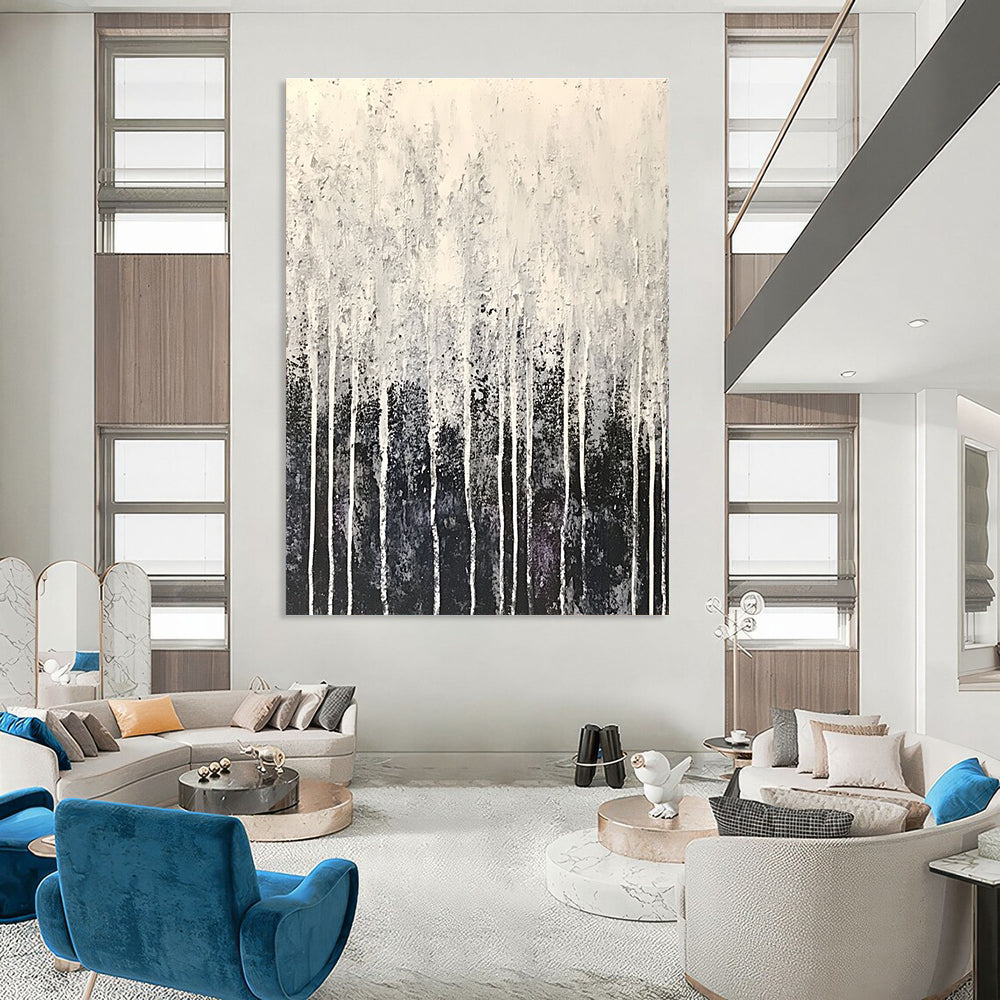 Large abstract painting in white and gray with drip effects and fine droplets resembling frost creating a serene winter atmosphere.STSC360