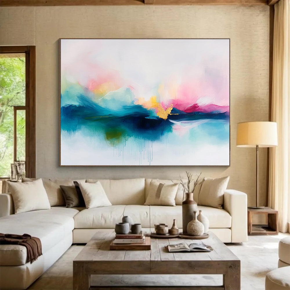 A large abstract painting featuring soft pastel colors in pinks and blues with delicate gold accents on a serene white background.SC383