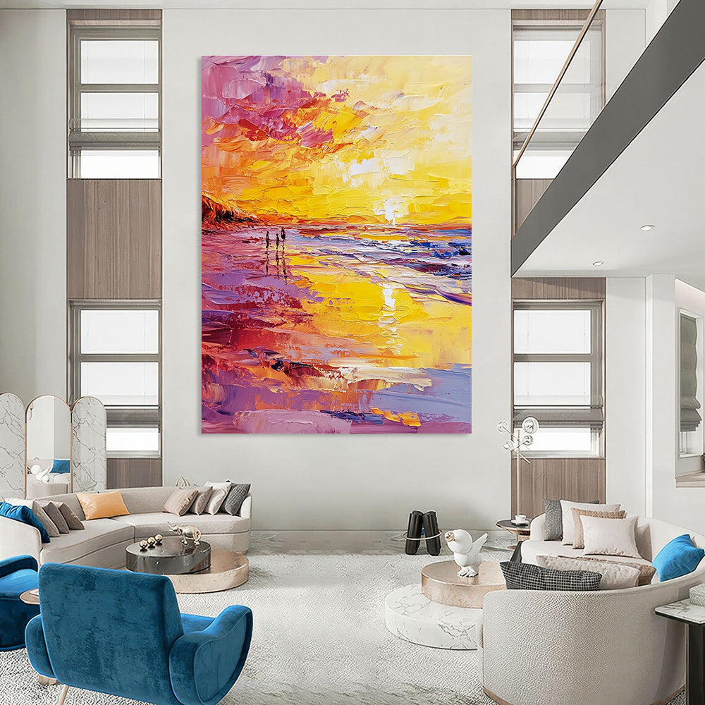 Abstract oil painting of a beach at sunset featuring a vibrant yellow and pink color scheme with small figures walking along the shore.STSC157