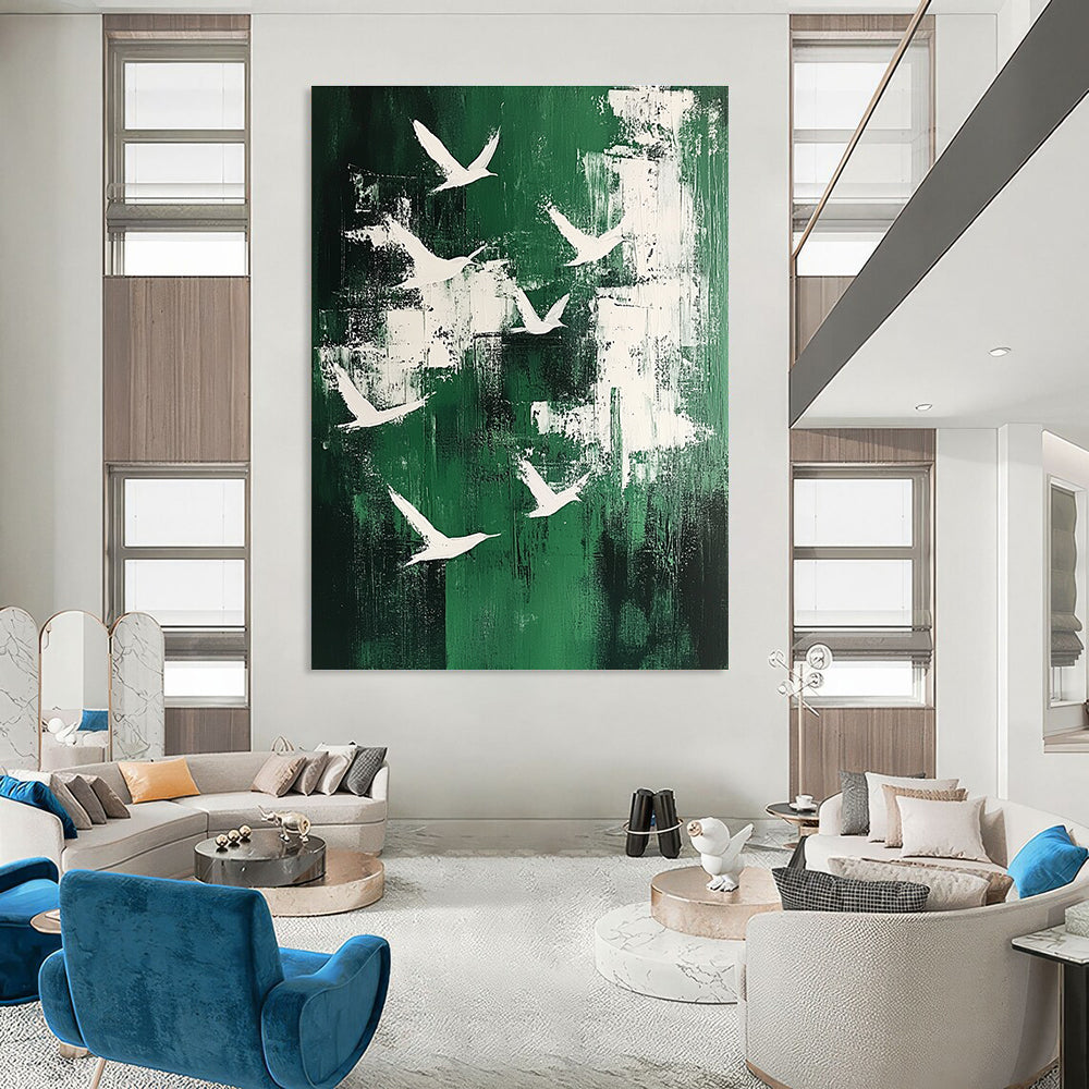 Large abstract painting featuring white birds soaring above an emerald green landscape in a minimalistic style.STSC363