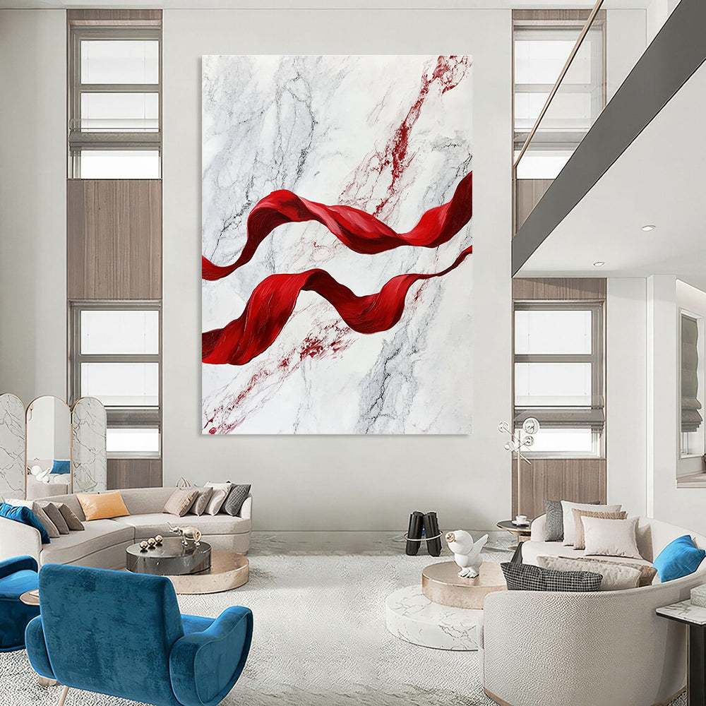 A large abstract painting featuring red flowing ribbons on white marble, evoking movement and elegance in a captivating blend of color and texture.STSC1416