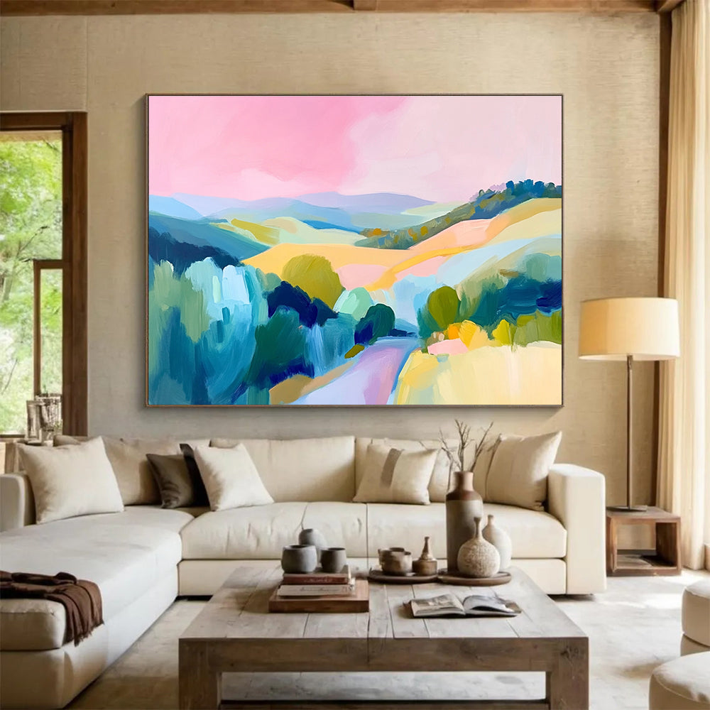 Large abstract painting of the French countryside featuring rolling hills a pink sky and vibrant blue green and yellow brush strokes.SC129