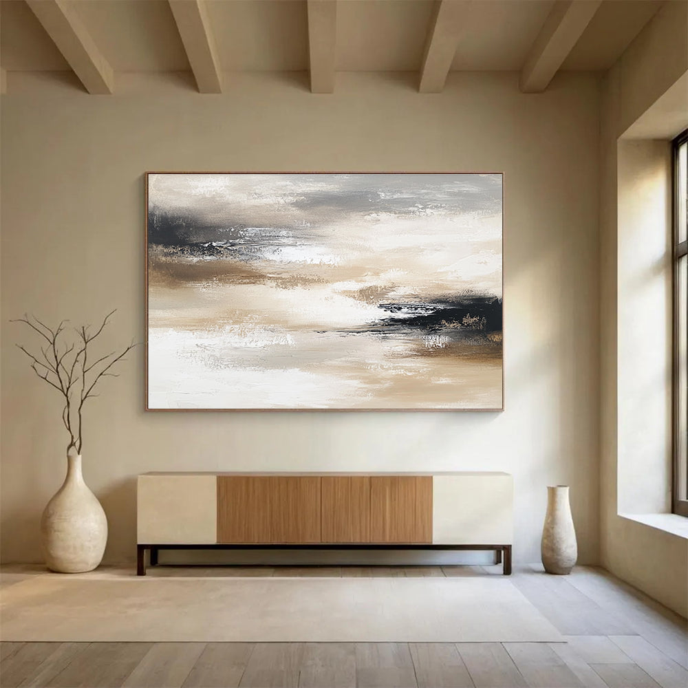 Large abstract painting in neutral tones evokes calmness with layers of soft grays browns beige whites and black creating movement and depth.SC246