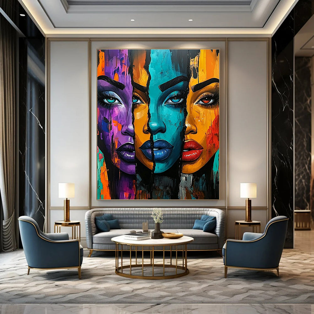 A large abstract painting featuring three vibrant African American women with bold colors and expressive features set against an energetic urban-inspired background.STSC1220