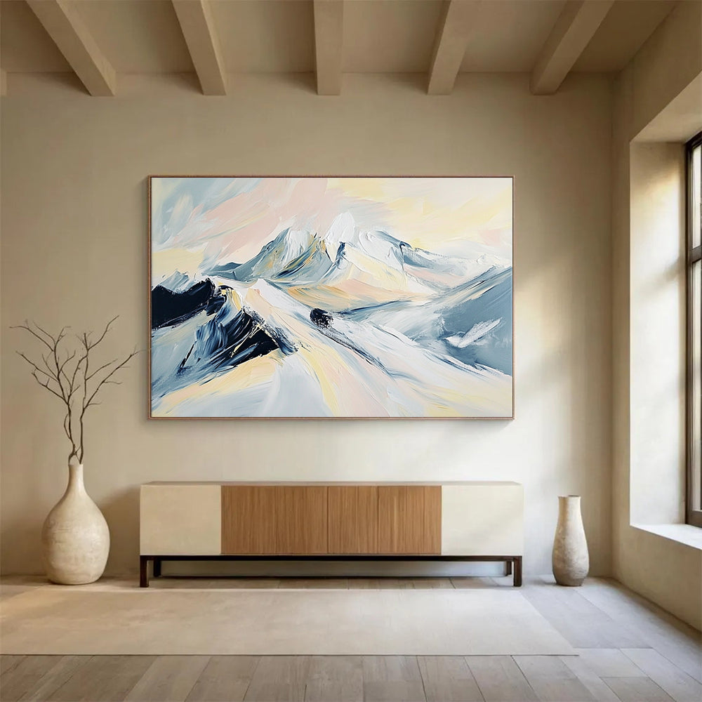 Large abstract painting of snowy mountains featuring soft hues of light gray pale pink beige and black.SC199