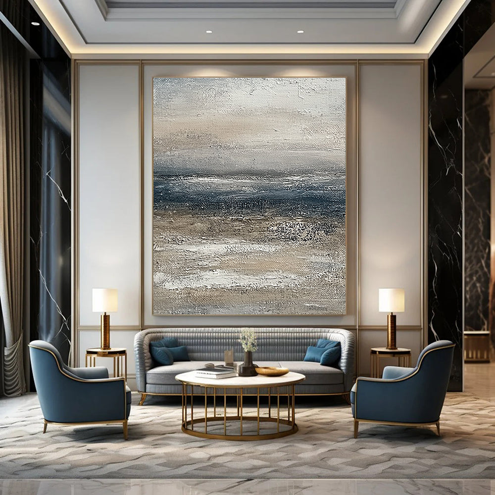 Large abstract painting of the ocean featuring muted beige and grey tones with a soft textured effect on canvas.STSC833