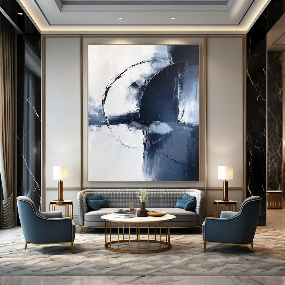 Large abstract painting in light navy and white tones featuring bold brushstrokes and an elegant minimalist style for sophisticated decor.STSC1355