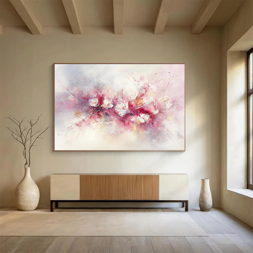 Large abstract painting of flowers in soft pink and white hues featuring bold brush strokes and delicate textures against a light background.SC191
