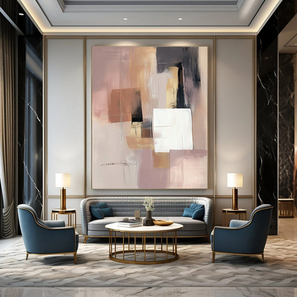 Large abstract painting in soft pink beige and grey with white squares and a brown gray shape featuring gold accents.STSC808