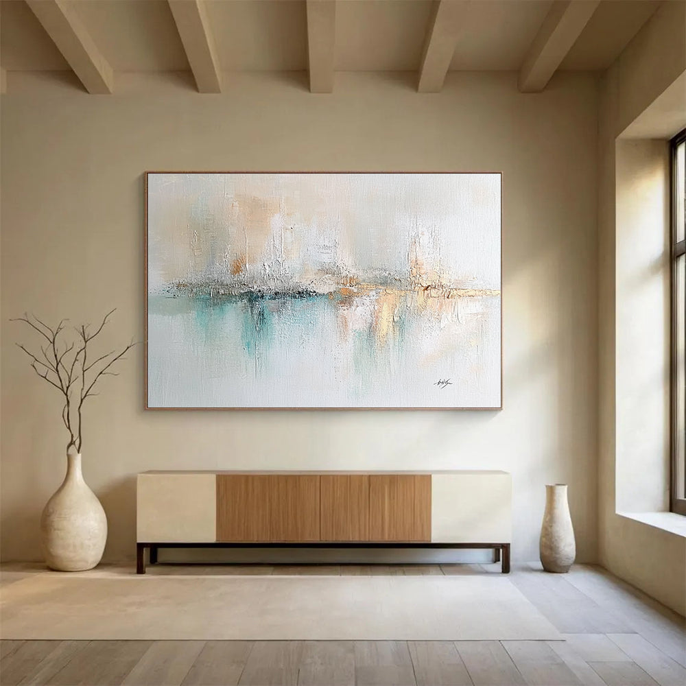 Large abstract painting on textured canvas featuring soft pastels cream mint green muted blue and hints of gold with impressionist brushwork.SC208