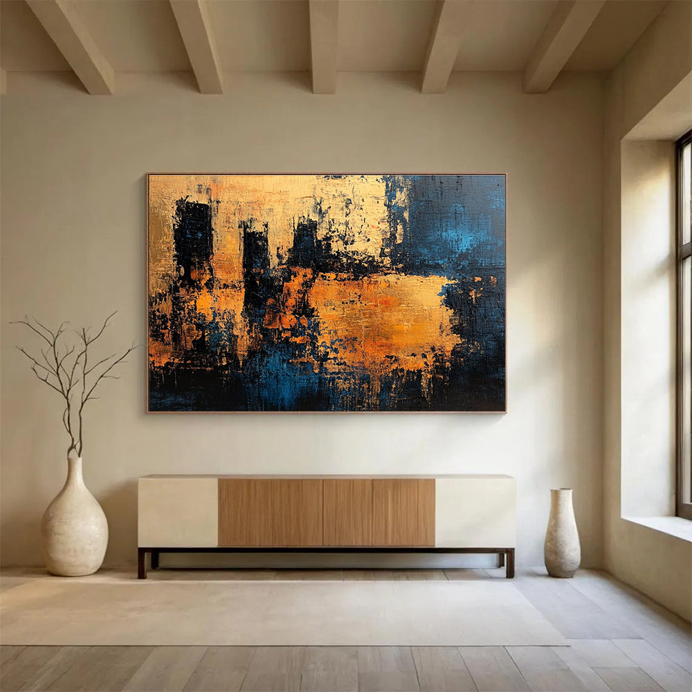 Large abstract painting with textured surface in dark blue and gold suggesting an ancient castle wall radiating warmth and history.SC371