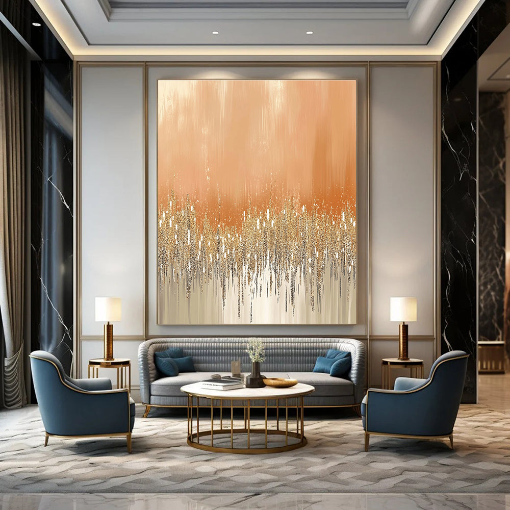 Large abstract painting featuring glittery gold and silver dust on a peach-fuzz beige background ideal for festive or glamorous settings.STSC980