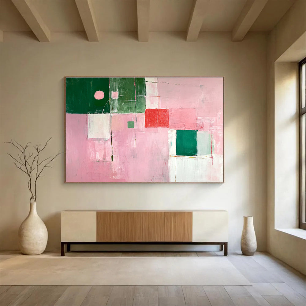 A large abstract painting featuring soft pink and green shapes creates a calming atmosphere with an inviting glow and an empty center.SC538