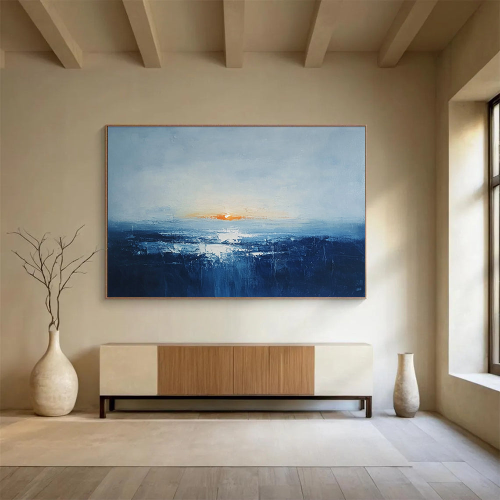 Abstract oil painting of an Irish landscape at sunrise featuring muted colors dark blue sea and an orange sun peeking over a grey skySC106