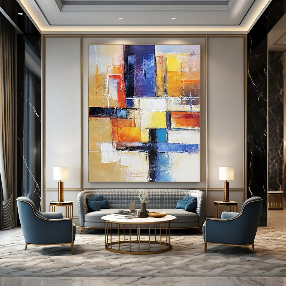 Large abstract painting of an urban landscape in warm colors featuring geometric shapes and soft lines on canvas.STSC153