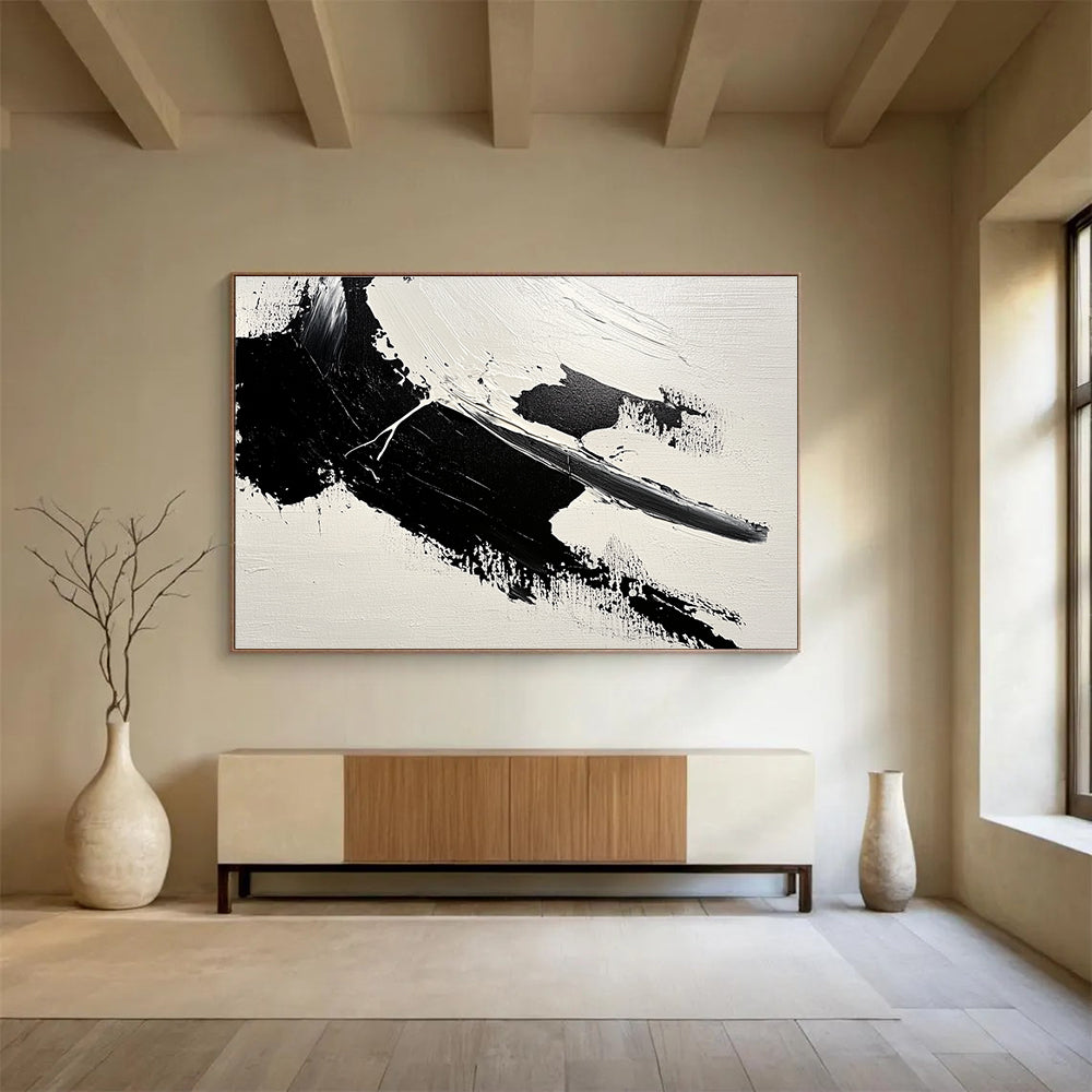 Large abstract painting featuring bold brushstrokes and textured areas of black and gray on a minimalist white background.SC574