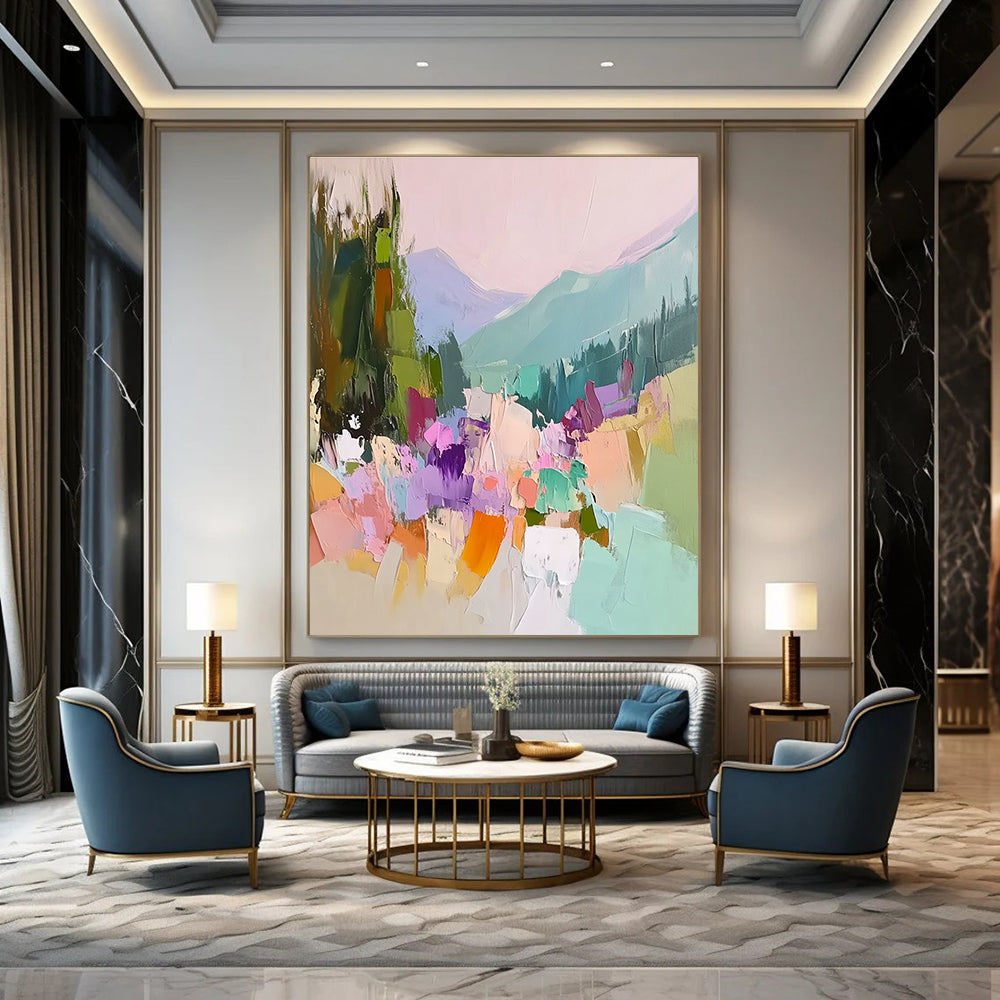 Large abstract painting featuring vibrant colors with trees flowers and mountains showcasing thick brush strokes and textured canvas in a harmonious light pink sky.STSC104