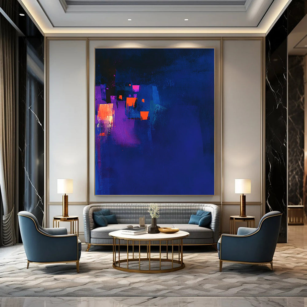 Large abstract painting in dark blue and violet with glowing orange highlights and a dark background capturing a chiaroscuro effect.STSC544
