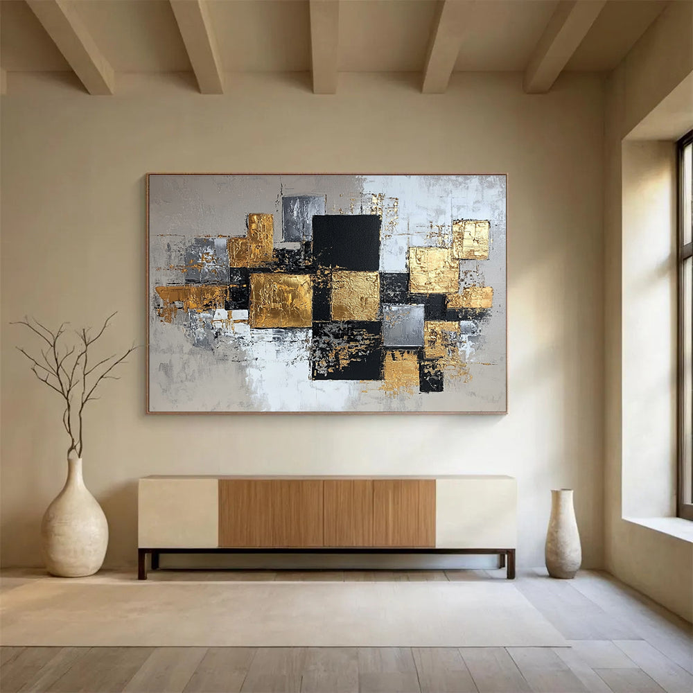 An abstract modern painting featuring elegant gold, silver, and gray squares on canvas, creating a sophisticated composition for any space.SC318