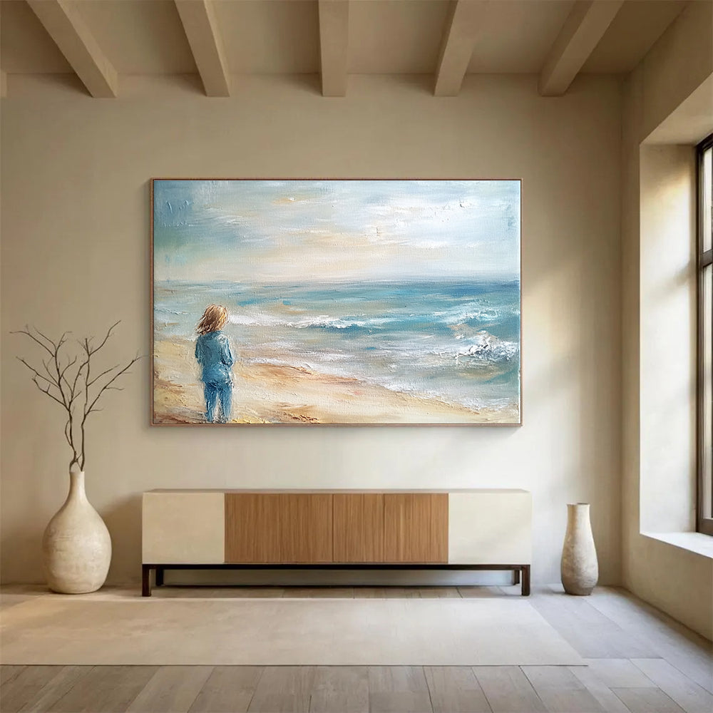 An abstract painting of the ocean and beach in light blue tones and muted colors creates a serene and beautiful atmosphere.SC411