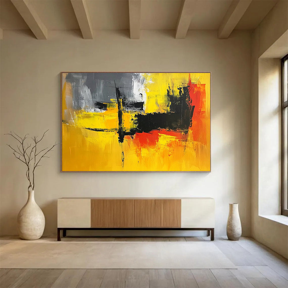 A large abstract painting featuring vibrant yellow, grey, and black hues, perfect for enhancing any contemporary space.SC393