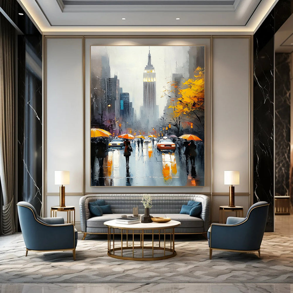 A large abstract painting capturing the Empire State Building with vibrant crowds on a rainy day featuring reflections and warm accents.STSC1137