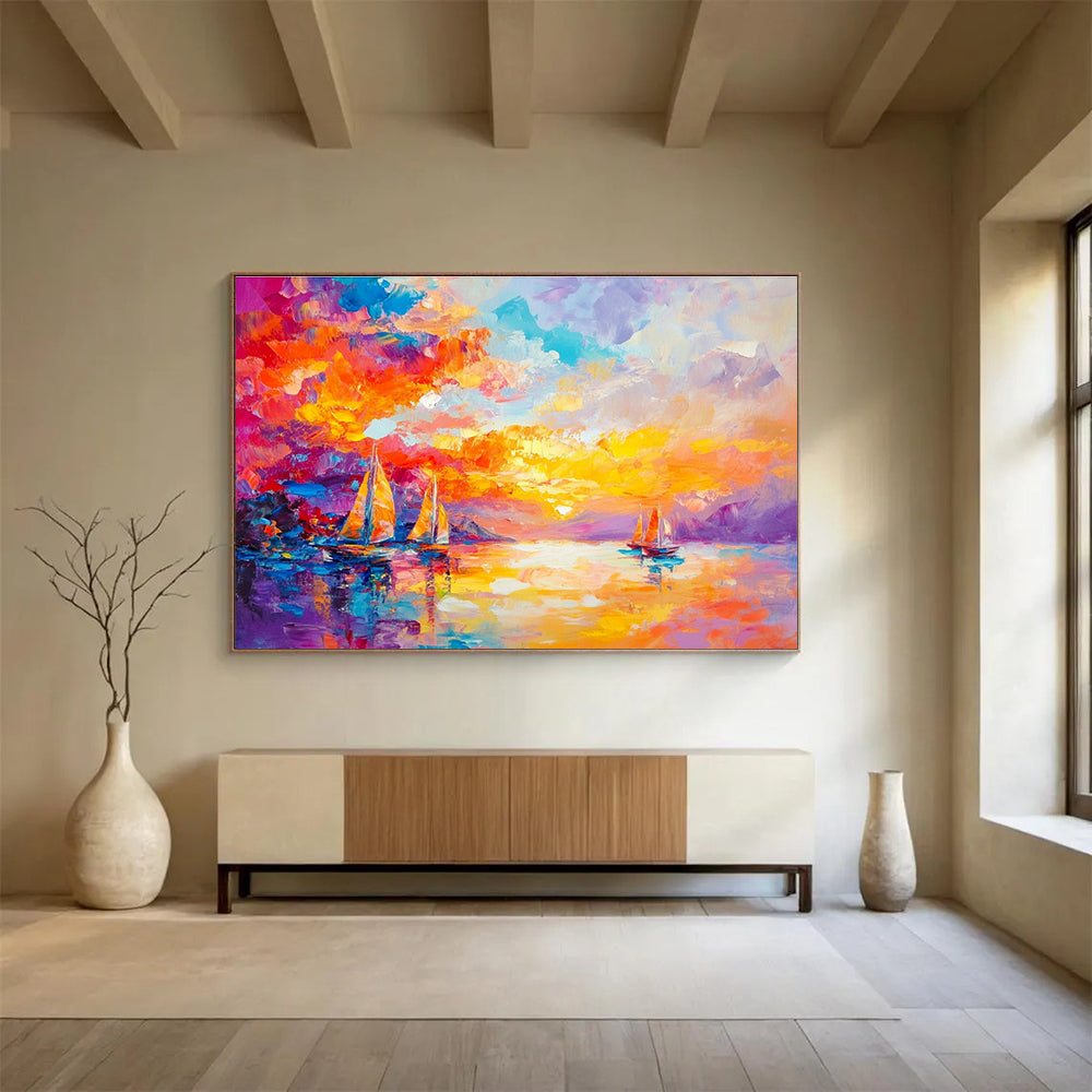Large abstract painting capturing a vibrant sunset over the sea with sailboats in a colorful and dreamlike style.SC180