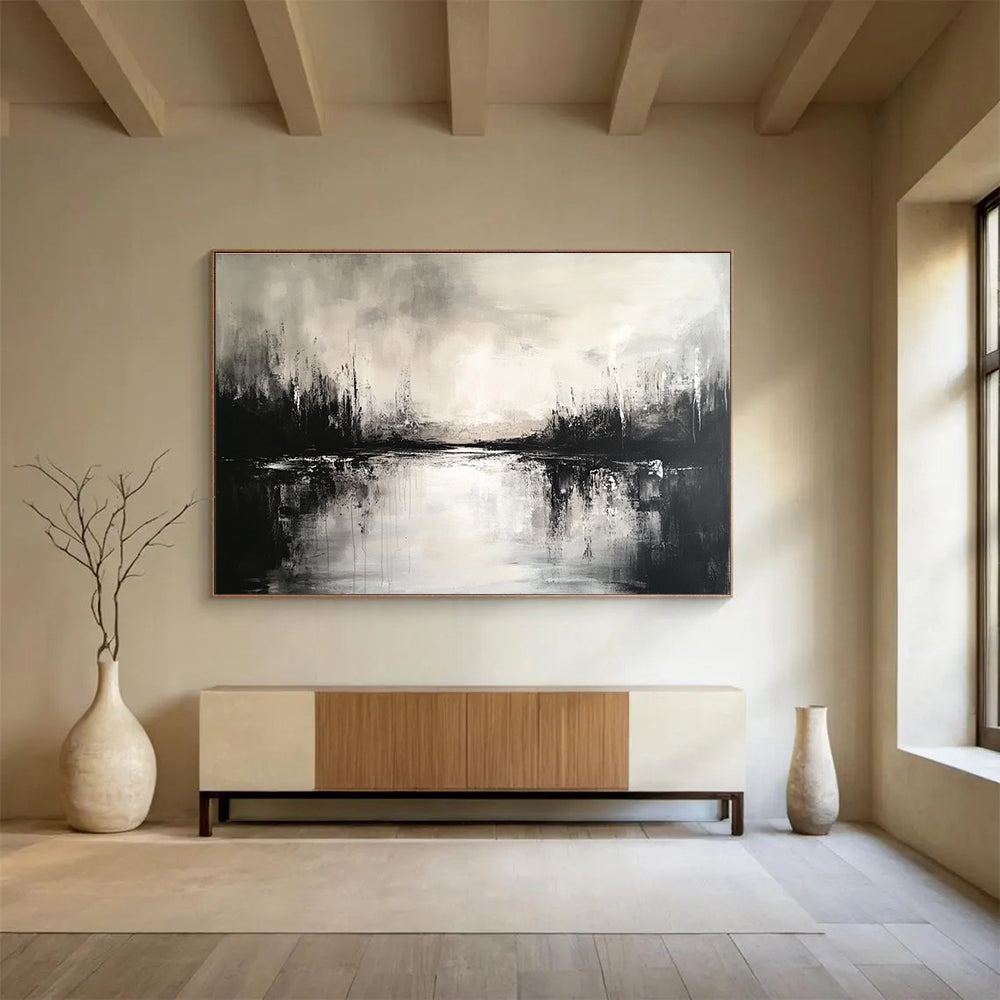 Large abstract painting featuring a black and white landscape with a serene lake and soft reflections, creating an atmospheric ambiance.SC011
