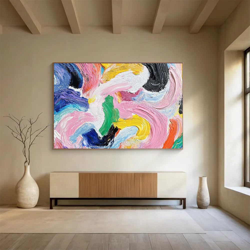 A large abstract painting with vibrant swirls of color and bold shapes, featuring a graceful silhouette of a woman with a high ponytail.SC436
