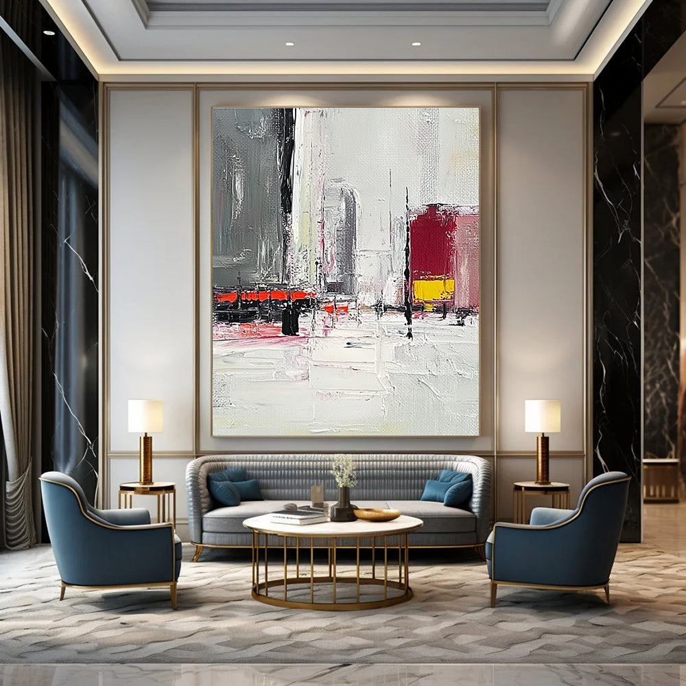 Large abstract painting featuring a grey and white urban landscape with red and yellow accents and thick brush strokes on a textured canvas.STSC154